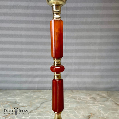 Lampe Catalin rouge avec base florale rose